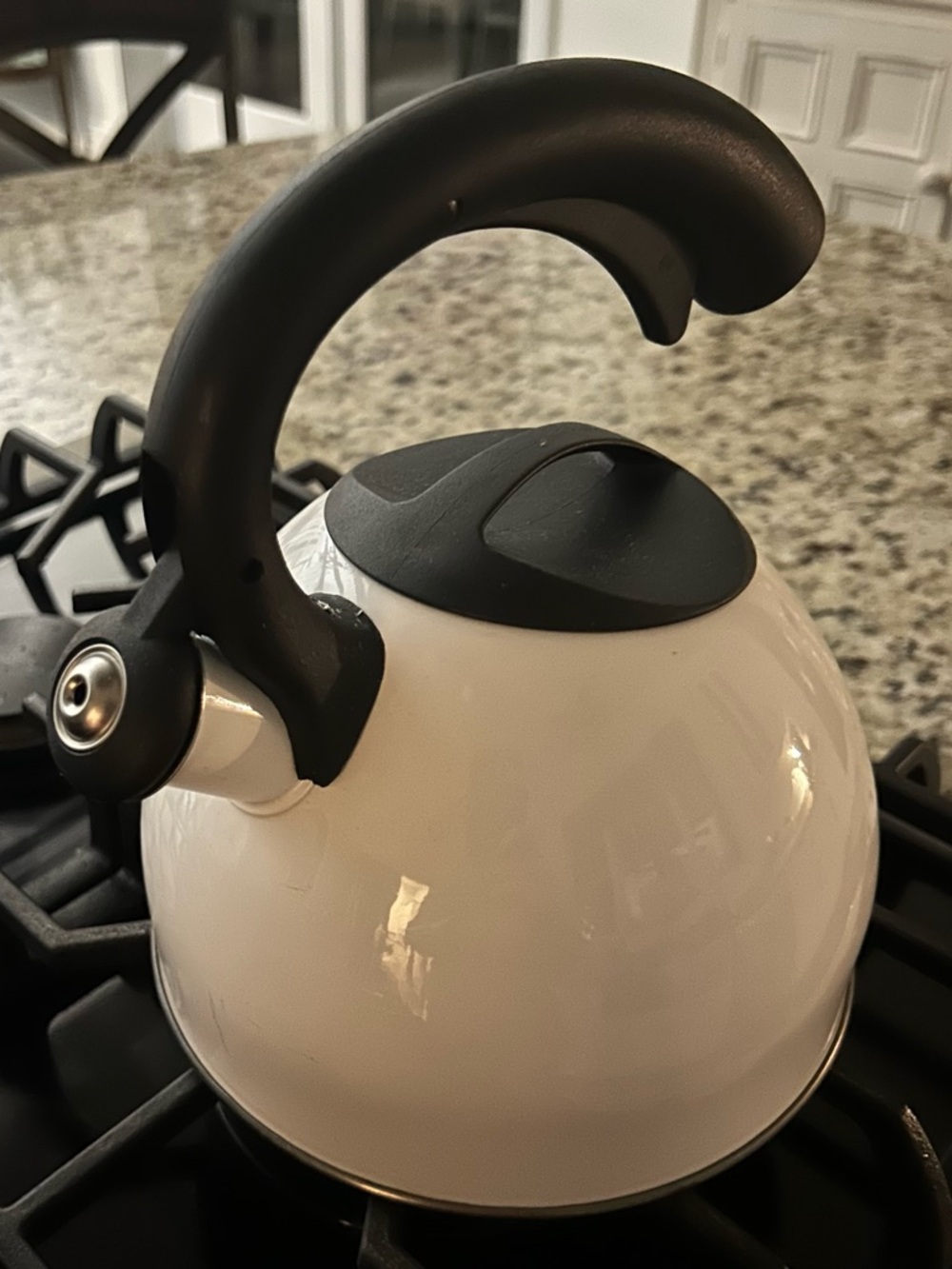 White Whistling Stovetop Kettle with Black Handle
